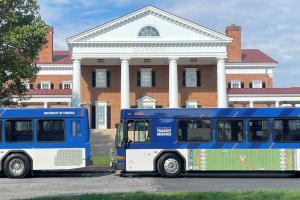 University of Virginia transit buses parked in front of Saunders Hall