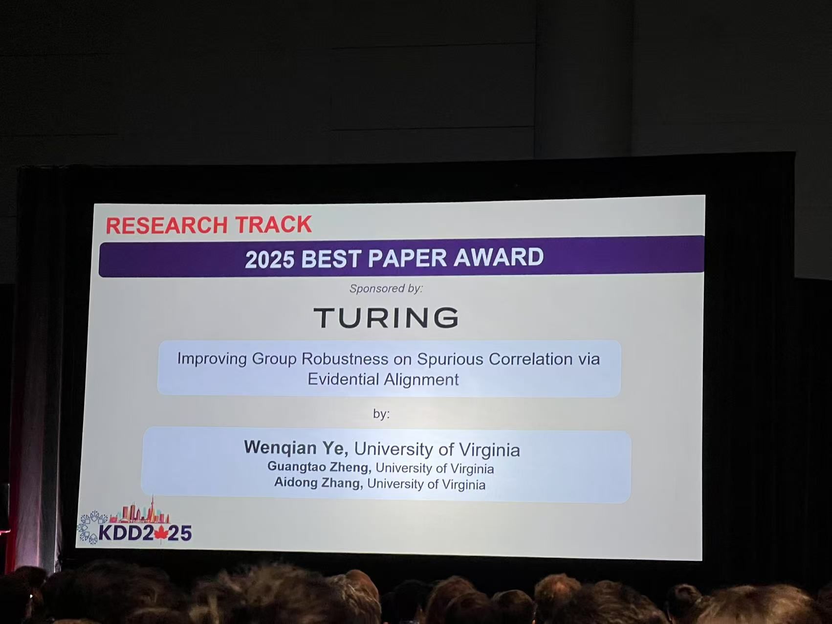 screen showing best paper award slide