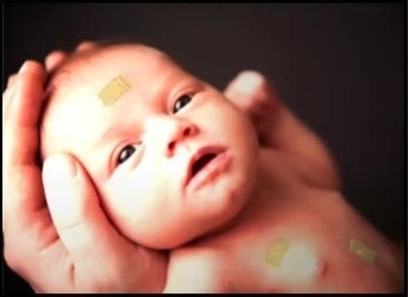 An infant with small wireless monitors