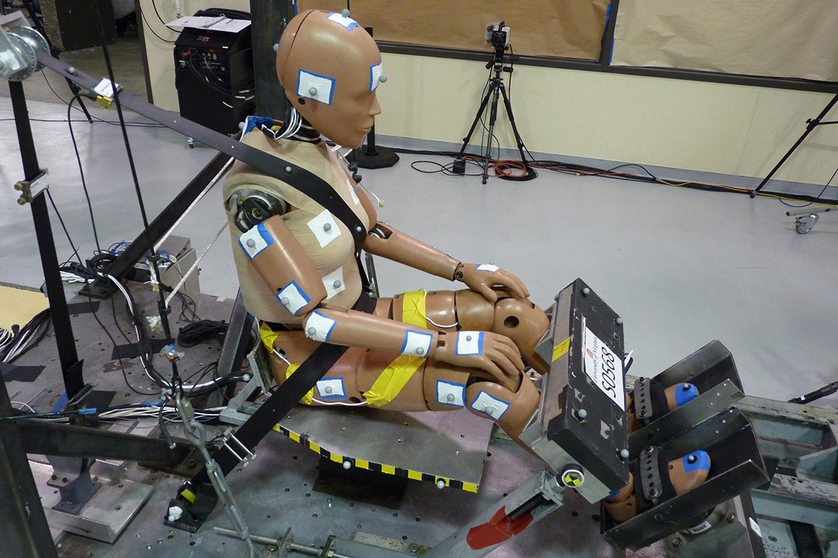 A female crash test dummy sits in an apparatus that tests restraint systems, or seatbelts, during sudden stops. Contributed photo