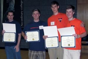 The first-place &quot;Cap Busters&quot; Team members are, from left, Shawn Gillum, Bryan Kessel, Eric Butler and Erik Schiminger.