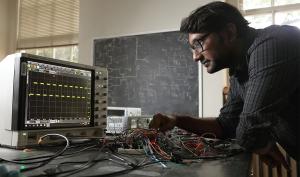 Antik Mallick working with machines