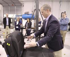 Center director Jason R. Kerrigan demonstrates a piece of test equipment for the NHTSA team. From left to right: Cem Hatipoglu, NHTSA’s associate administrator for vehicle safety research, Ann Carlson, NHTSA’s acting administrator, Veronica Morales, NHTSA’s communication director, Ms. Carlson’s assistant, Jason Kerrigan and Matthew Craig, NHTSA’s Chief, Human Injury Research Division.