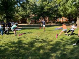 Chemical Engineering graduate students playing tug of war on the McCormick lawn. 