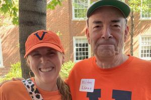 Alumni MIlton Adams and Amy Weisberg attend the BME Football Tailgate