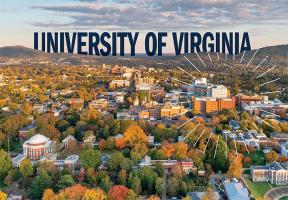 Aerial view of UVA grounds with the words Univerity of Virginia transposed on the horizon and the medical preceint highlighted