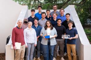 Professor Christopher Goyne stands bottom, far left, with HEDGE capstone students.