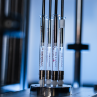 syringes on multi-inlet vortex mixer