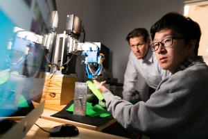 Greg Gerling and Chang Xu in the lab.
