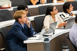 students watch a presentation