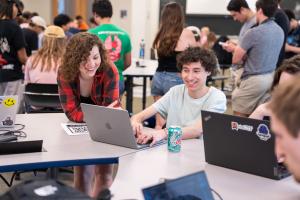 Students chat during expo