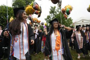 Students walking the lawn