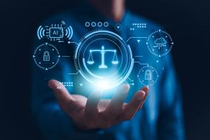 icons representing technology and ethics floating above an open palm