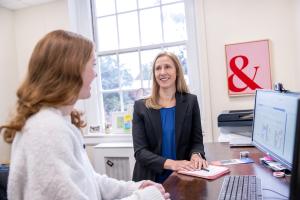 Julia Lapan works with a student in the Center for Engineering Career Development