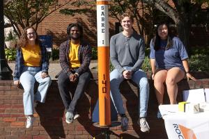 UVA Engineering rocketry team members with their Sabre 1 rocket