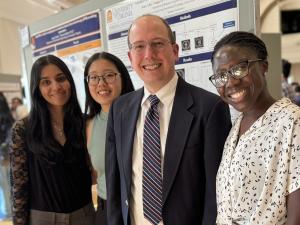 Dr. Timohty Allen with 3 Capstone Students from the Class of 2024.