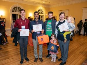 Group Photo of Postdocs (and young family members) at the 2023 Postdoc Appreciation Event in Alumni Hall