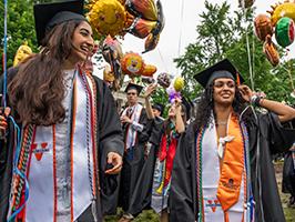 Happy BME graduates at 2024 Diploma Ceremony with Balloons
