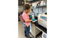 High school student working chemical engineering in lab