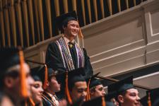 A student stands for recognition during the ceremony