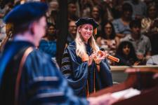 Chair Shayn Peirce-Cottler applauds students