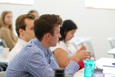 students watch a final presentation