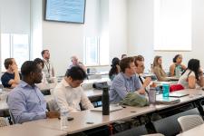 Audience watches a presentation