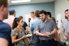 Students discuss a project.