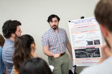 Students explain their poster
