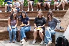 students seated at the picnic