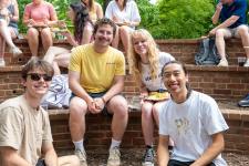 students seated together at the picnic