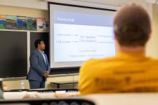 A student speaks during a presentation