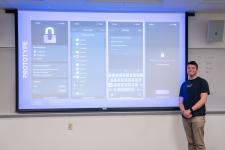 A student begins his capstone presentation