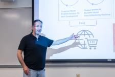 A speaker during a presentation