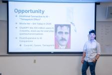 A student begins his capstone presentation