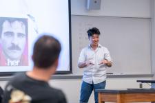 A student speaks during a capstone presentation
