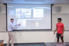 Prof. Doug Garland speaks during a presentation
