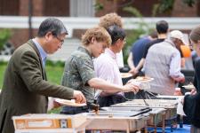Faculty, staff and students at the buffet