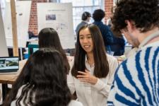 a student discusses a capstone project