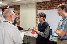 a student discusses a capstone project