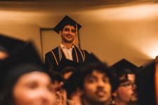 A student stands for recognition