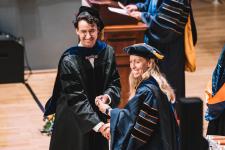 A student receives their diploma