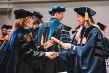 A student receives their diploma