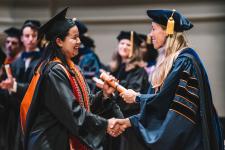 A student receives their diploma