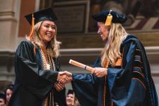 A student receives their diploma
