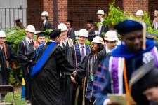 Professor congratulates students
