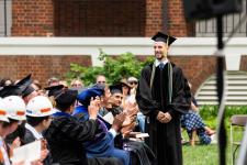 A graduate stands for recognition