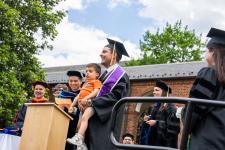 A Ph.D. student is hooded