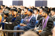 Ph.D. students seated at the diploma ceremony