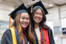 Students wait in line to receive their diplomas